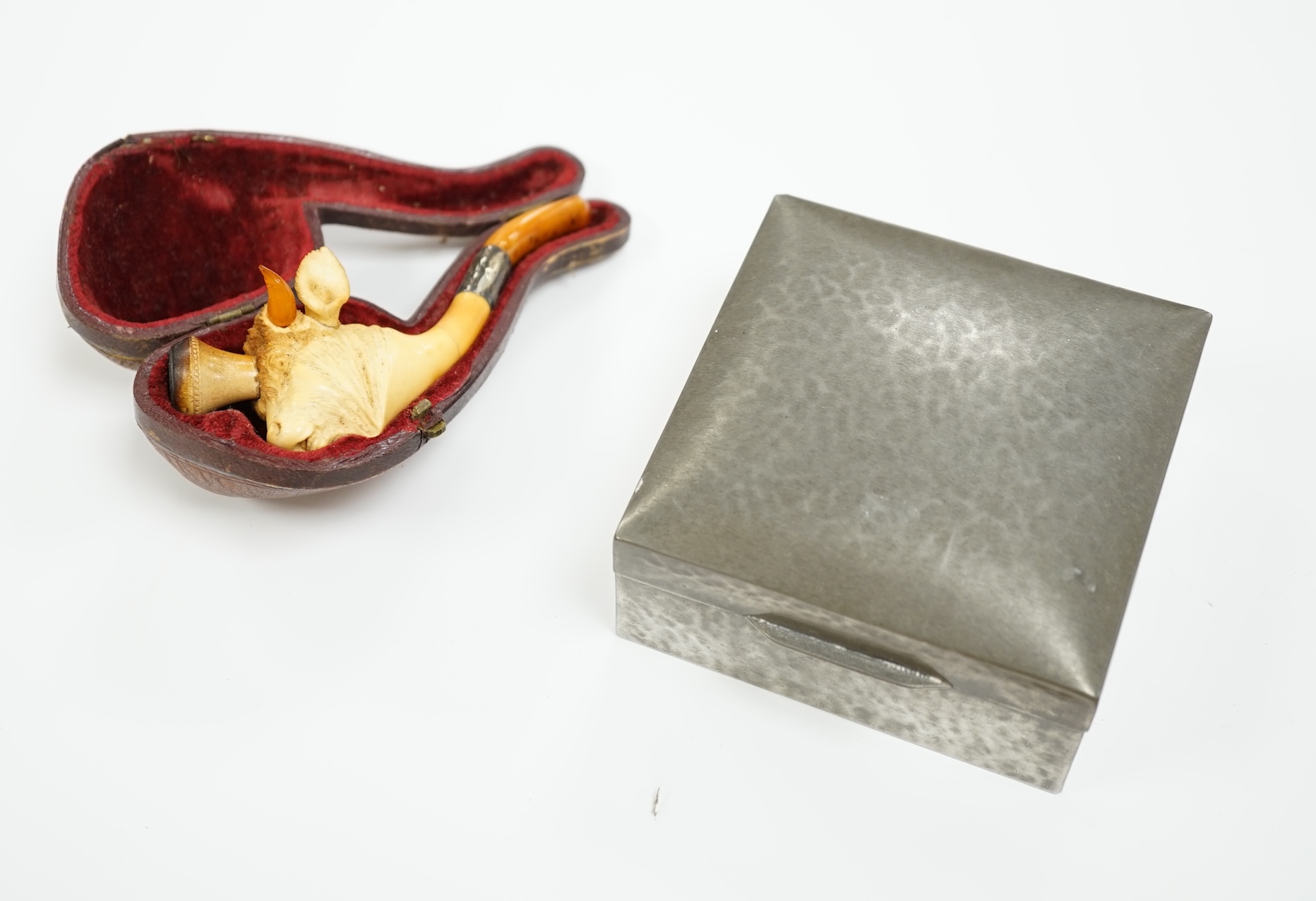 A cased Meerschaum pipe in the form of a bull and a Tudric pewter box, 9 x 9 x 5cm